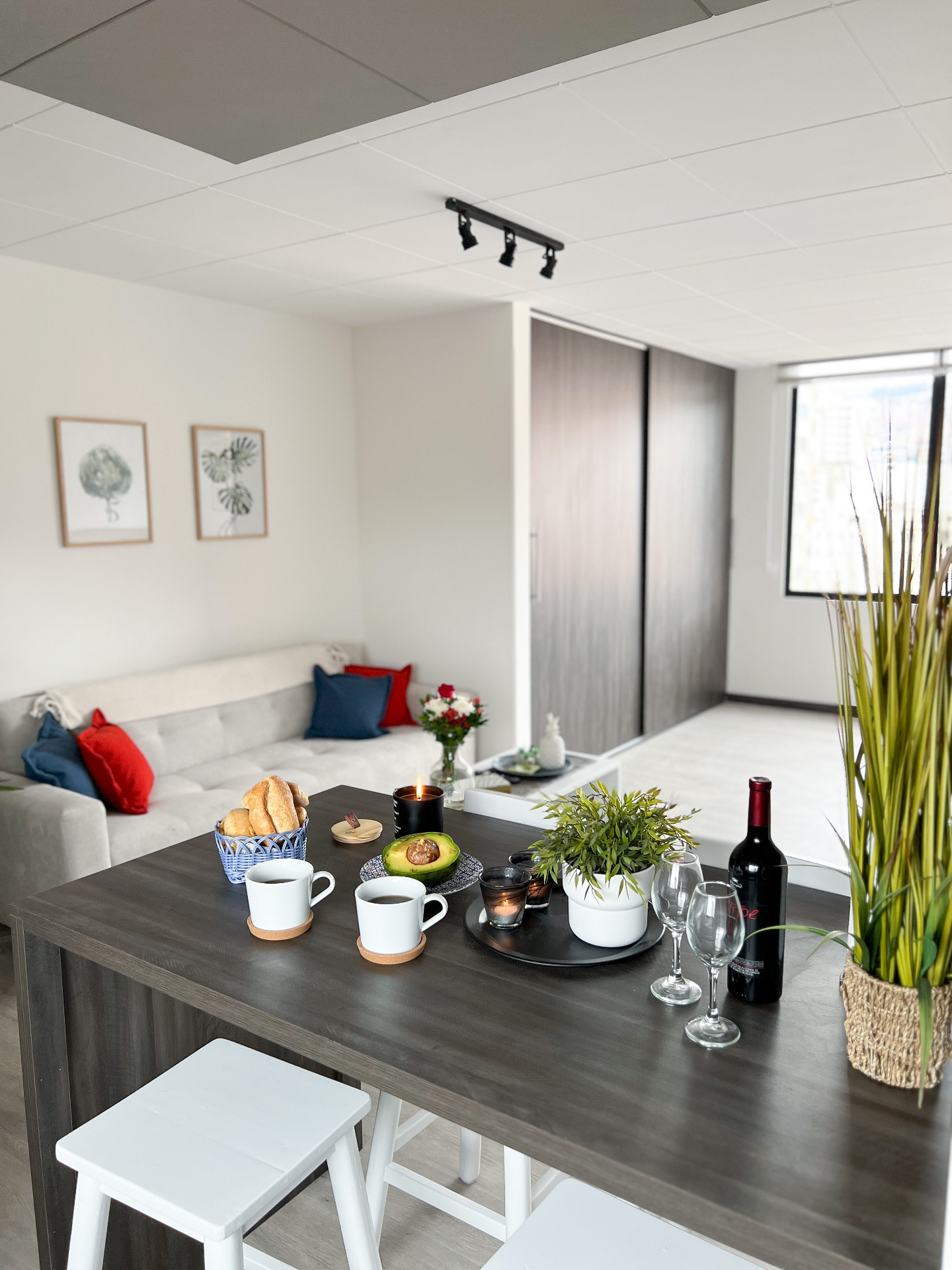 A welcoming breakfast and wine setting in the bright Calm Illimani apartment
